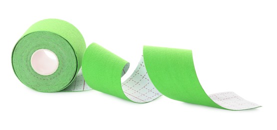Photo of Green kinesio tape in roll on white background