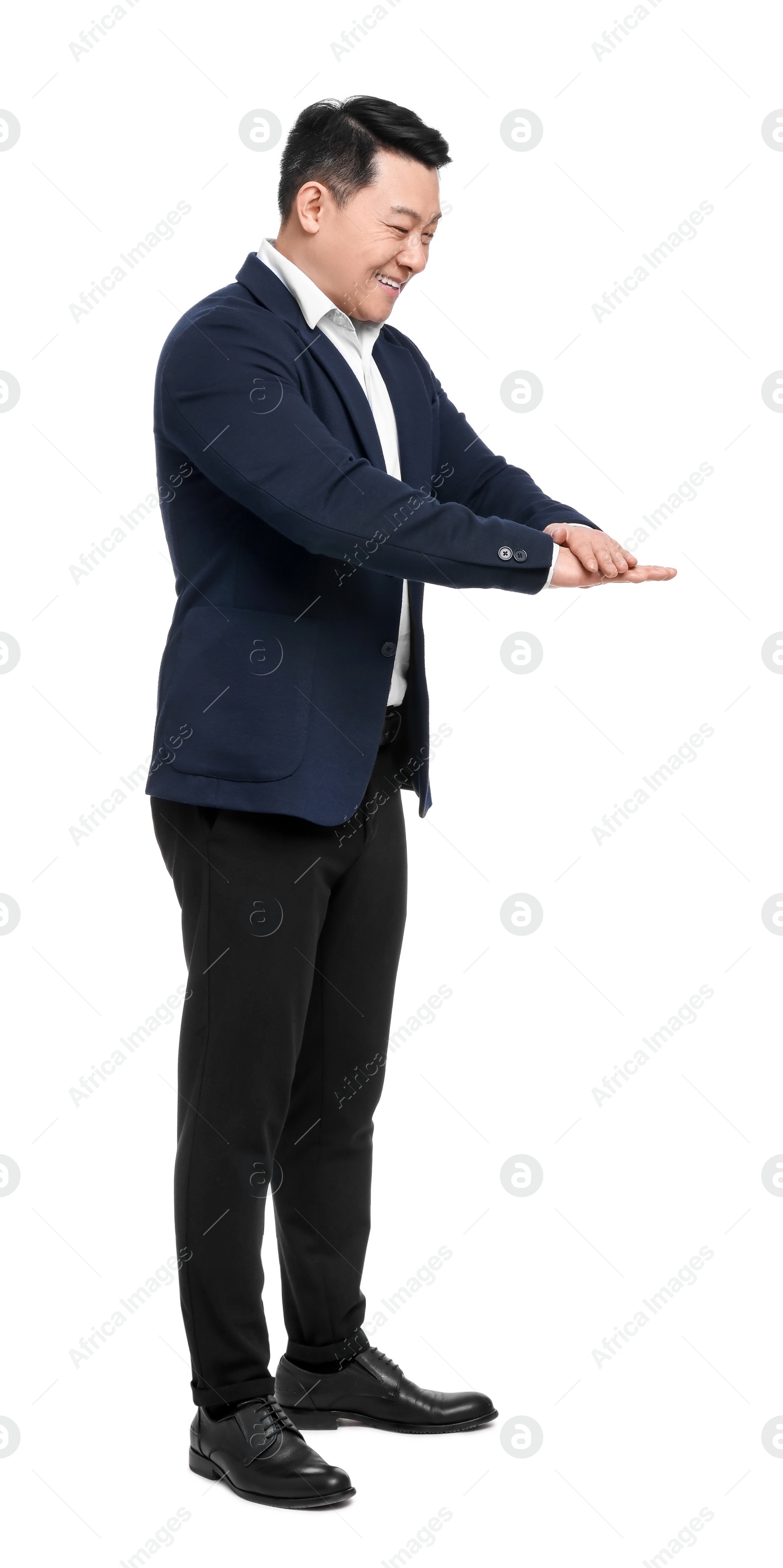 Photo of Businessman in suit posing on white background