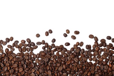 Photo of Many roasted coffee beans on white background, top view
