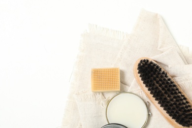 Photo of Composition with shoe care accessories on white background, top view