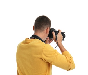 Photo of Young photographer with professional camera on white background, back view