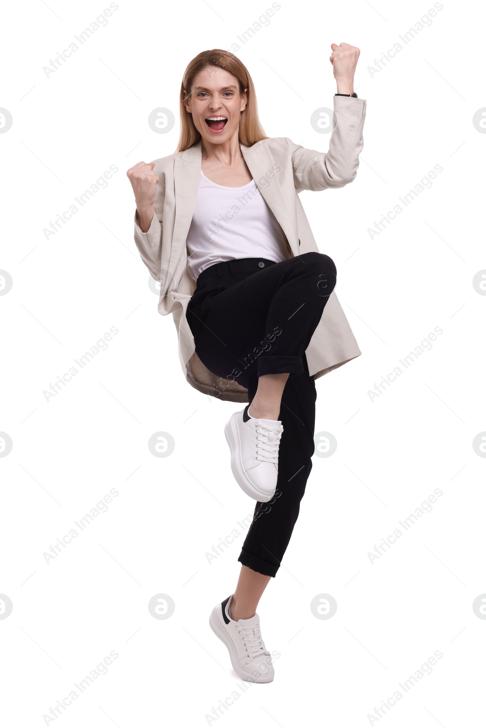 Photo of Beautiful excited businesswoman posing on white background