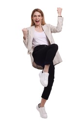 Photo of Beautiful excited businesswoman posing on white background