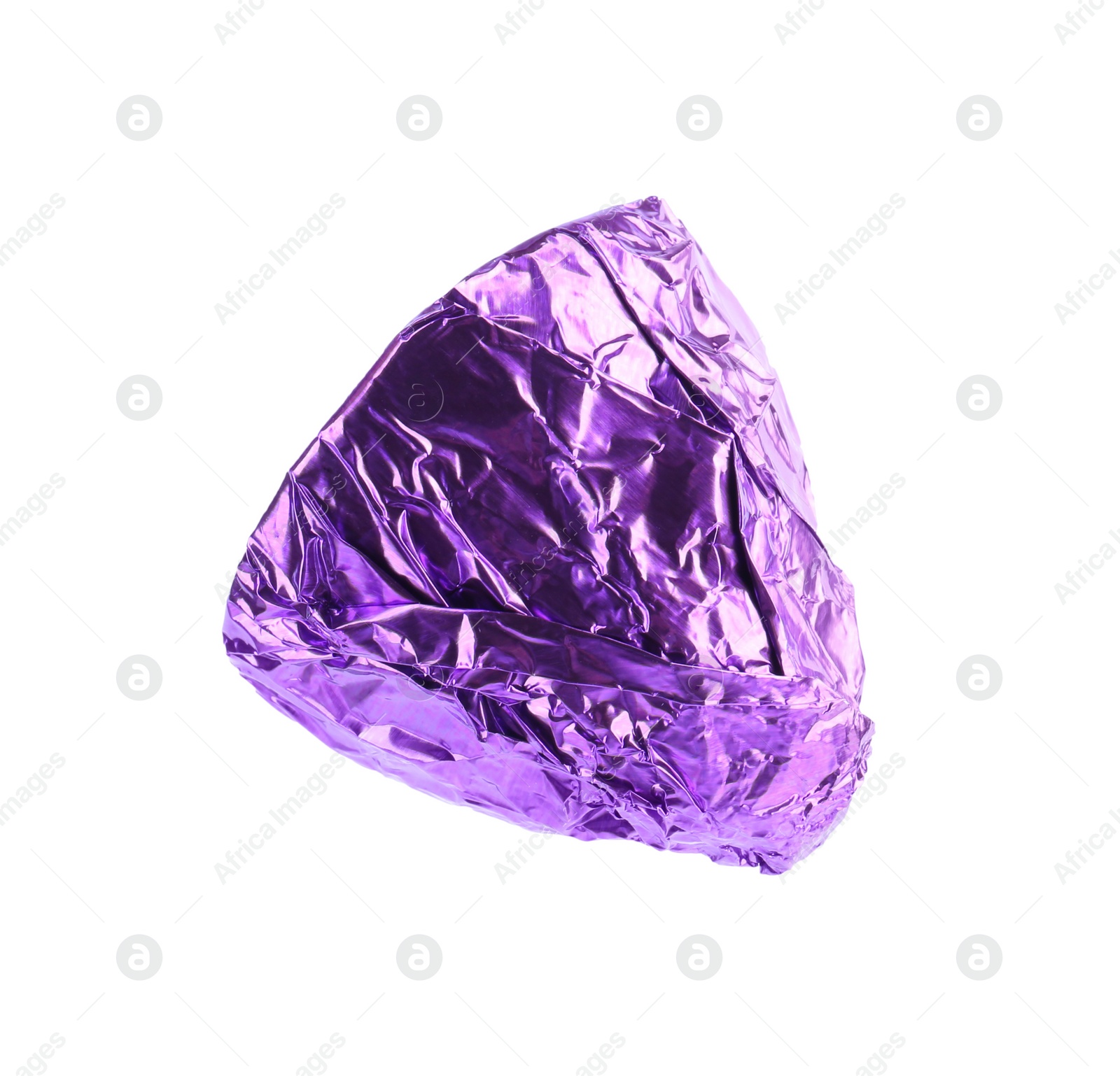 Photo of Tasty candy in purple wrapper isolated on white