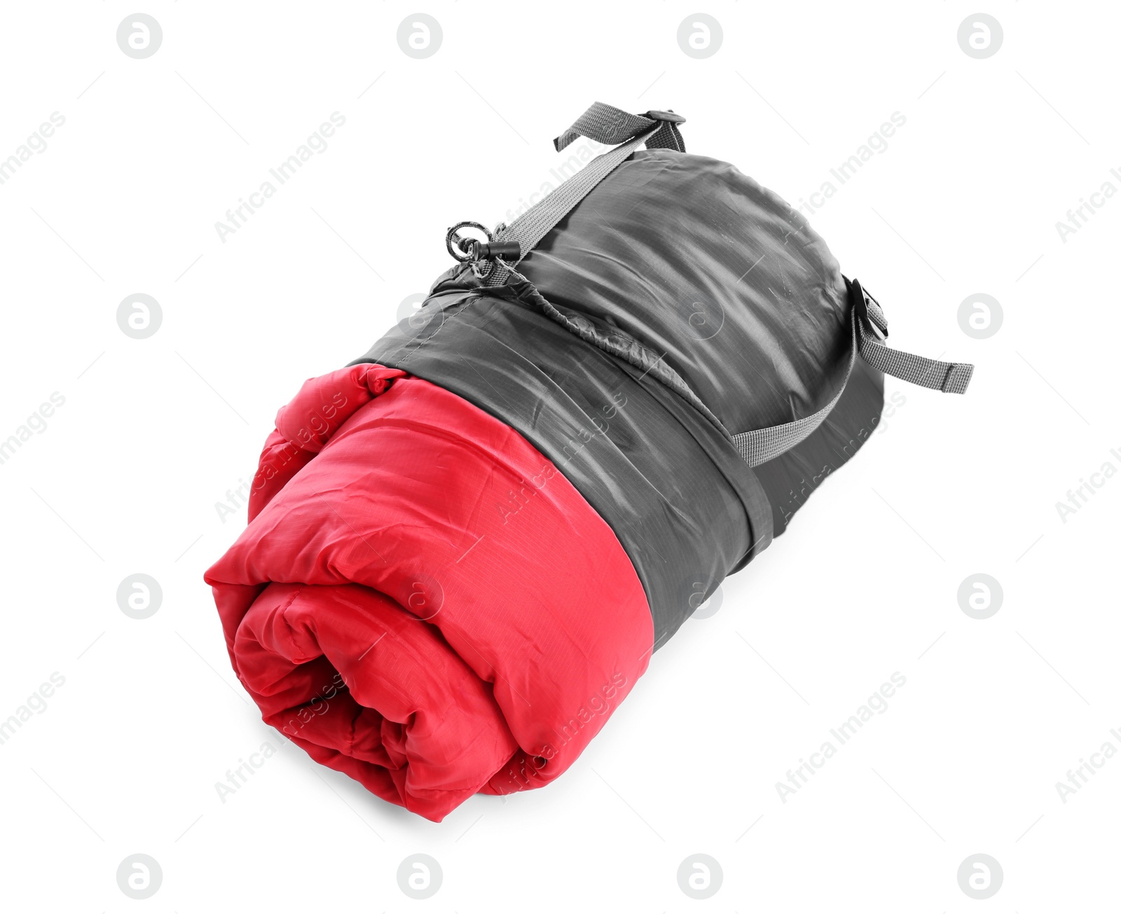 Photo of Rolled sleeping bag on white background. Camping equipment