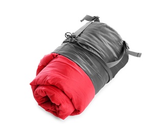 Photo of Rolled sleeping bag on white background. Camping equipment