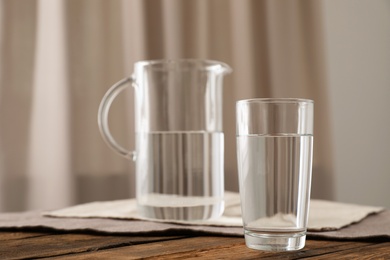 Photo of Glassware of fresh water on table indoors