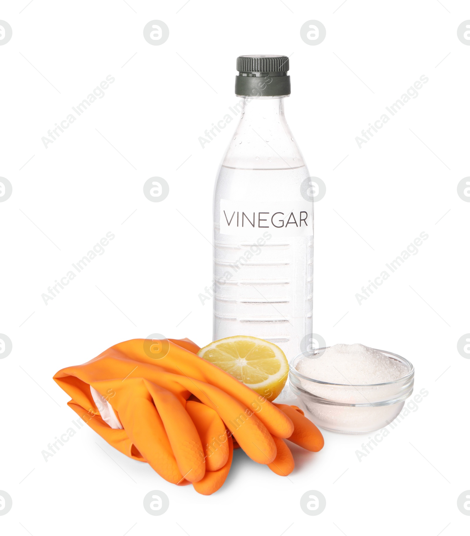 Photo of Eco friendly natural cleaners. Vinegar in bottle, gloves, cut lemon and bowl of soda isolated on white