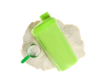 Photo of Protein shake in sport bottle and powder on white background, top view