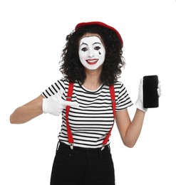 Photo of Funny mime with smartphone posing on white background