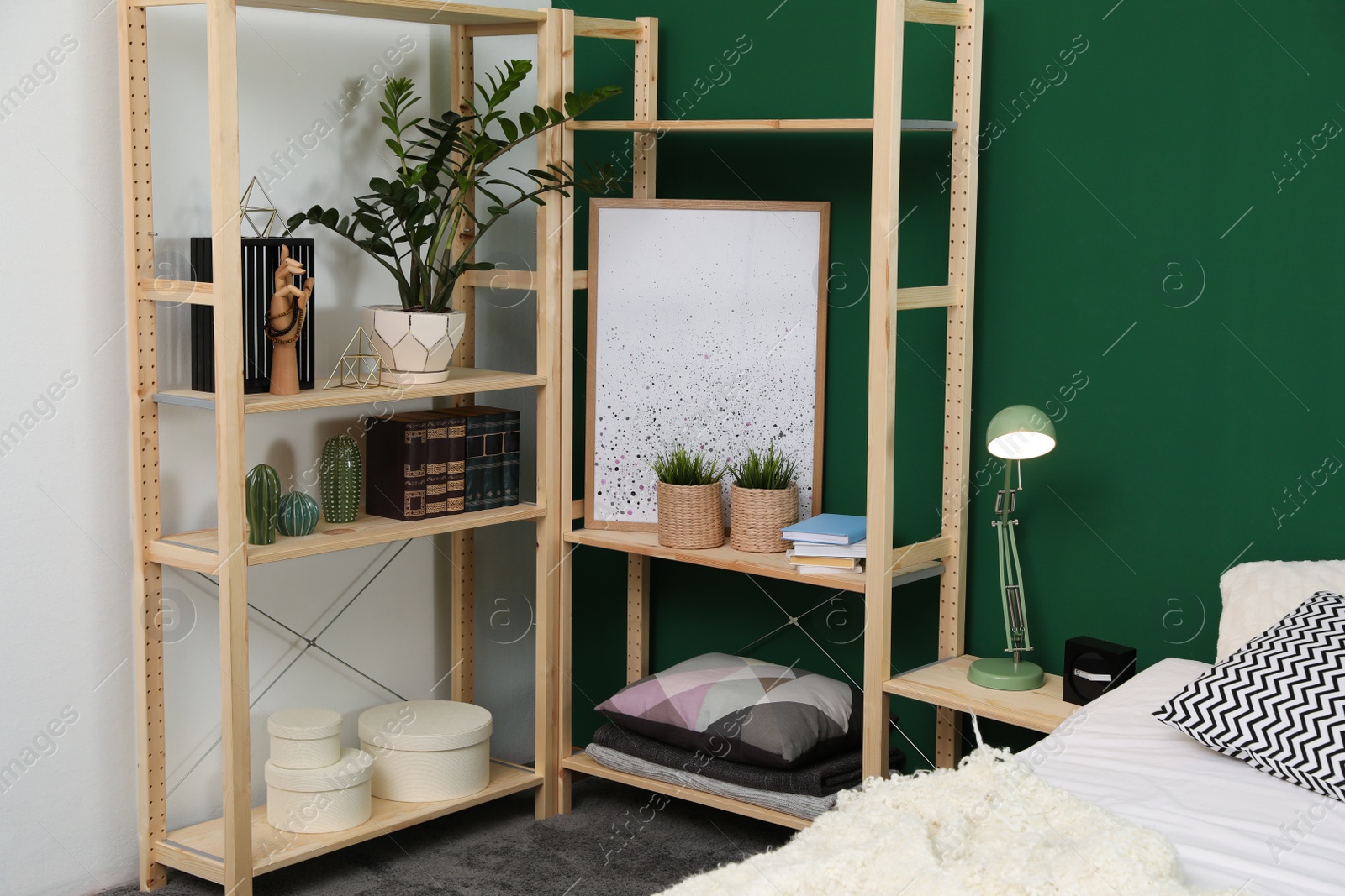 Photo of Wooden storage in stylish bedroom. Idea for interior design