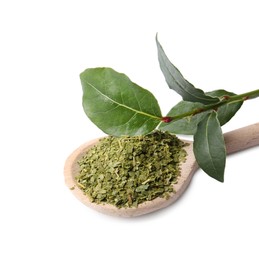 Photo of Spoon with ground and fresh bay leaves on white background. Space for text