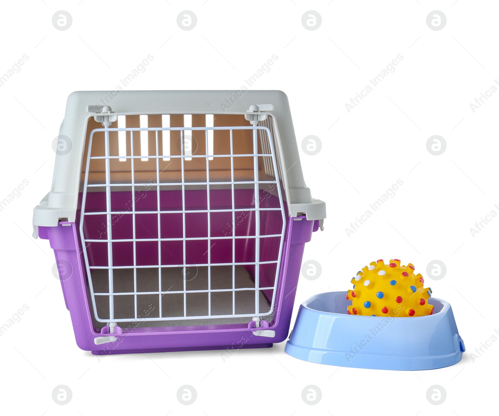 Photo of Violet pet carrier and bowl with toy isolated on white