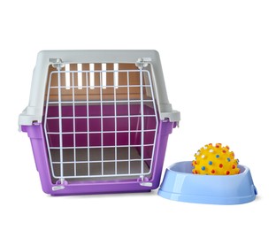 Violet pet carrier and bowl with toy isolated on white