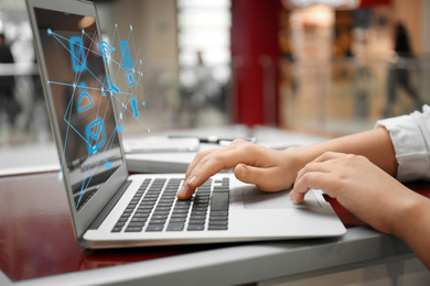 Image of Woman working with laptop in cafe, closeup. Modern technology concept