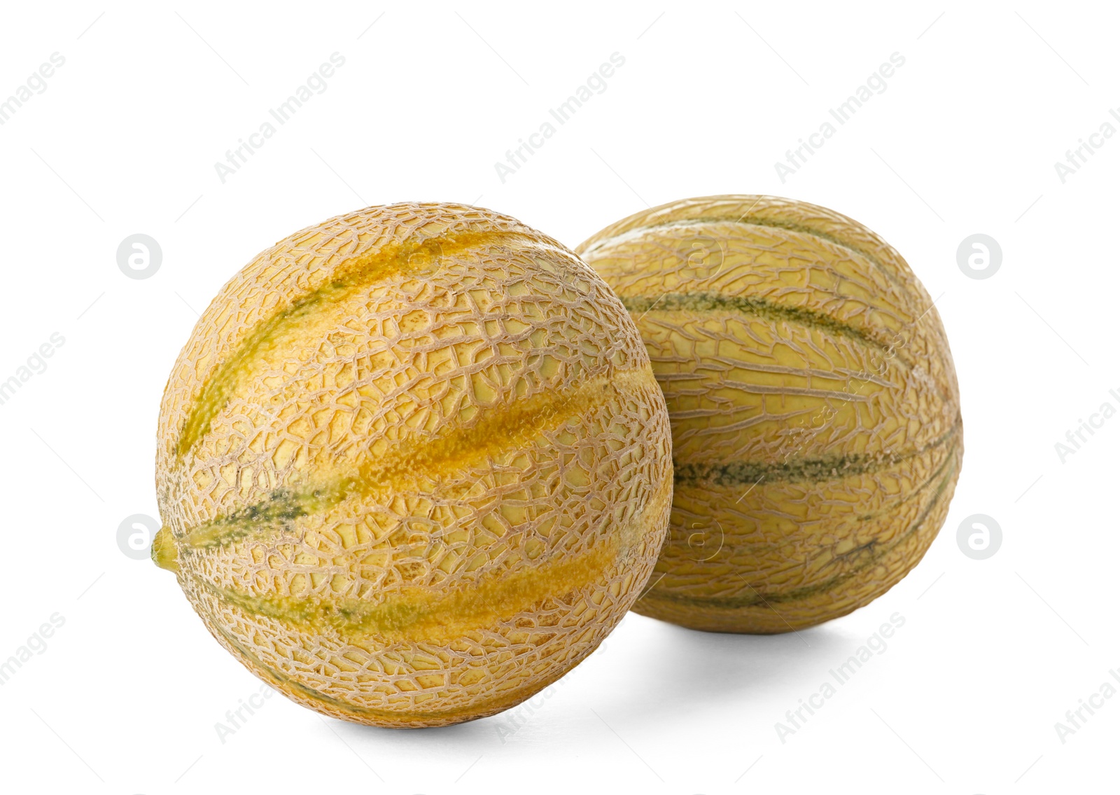 Photo of Whole tasty ripe melons on white background