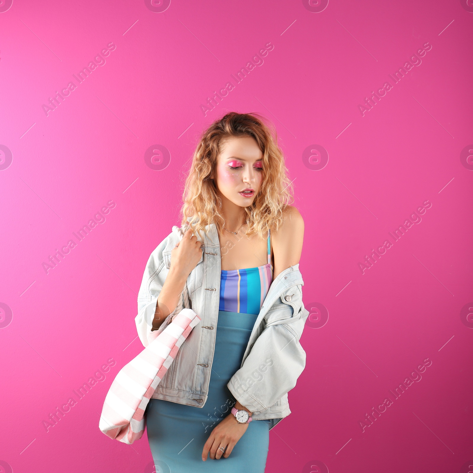 Photo of Beautiful young woman posing on color background. Summer fashion