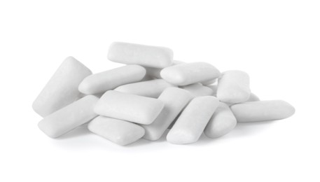 Pile of tasty chewing gums on white background