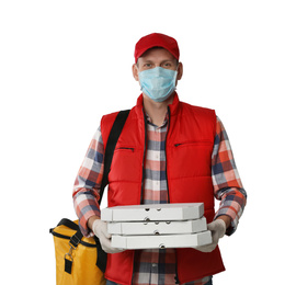 Photo of Courier in protective mask and gloves holding pizza boxes on light background. Food delivery service during coronavirus quarantine