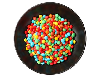 Photo of Bowl with colorful candies isolated on white, top view