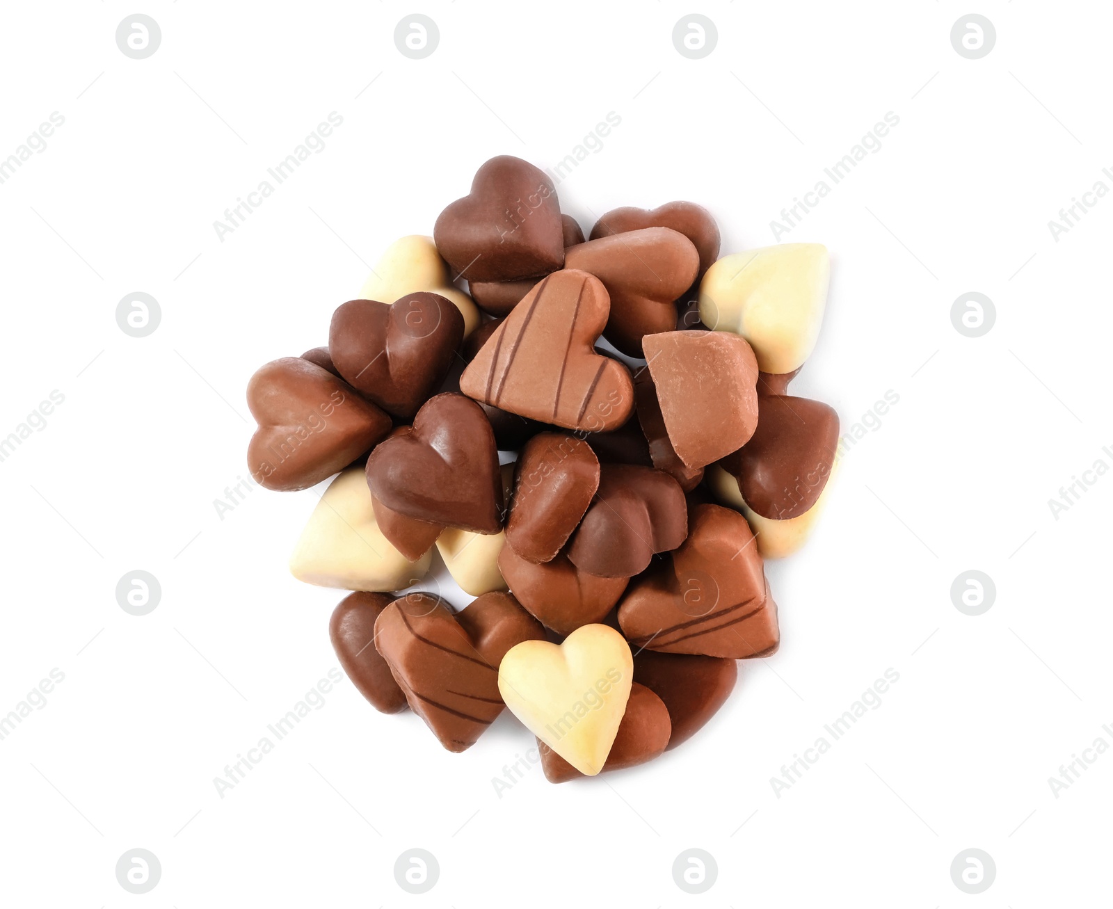 Photo of Delicious heart shaped chocolate candies on white background, top view