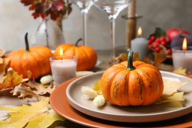 Photo of Beautiful autumn place setting and decor on table, closeup. Space for text