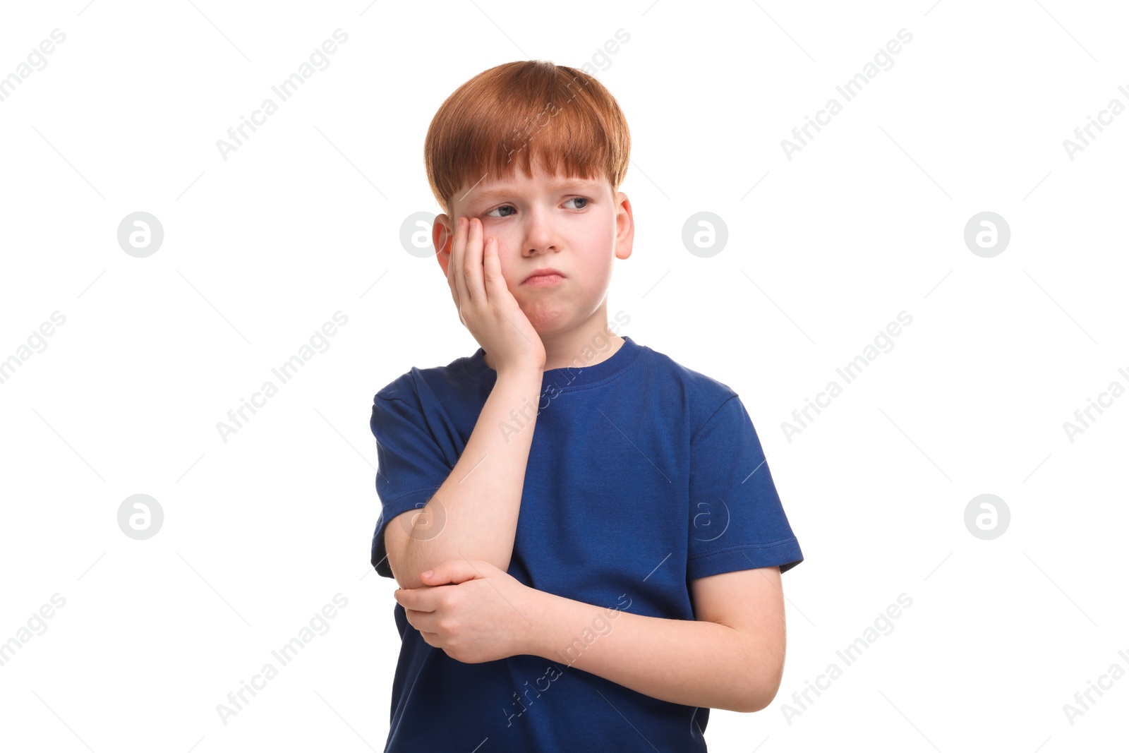 Photo of Portrait of sad little boy on white background