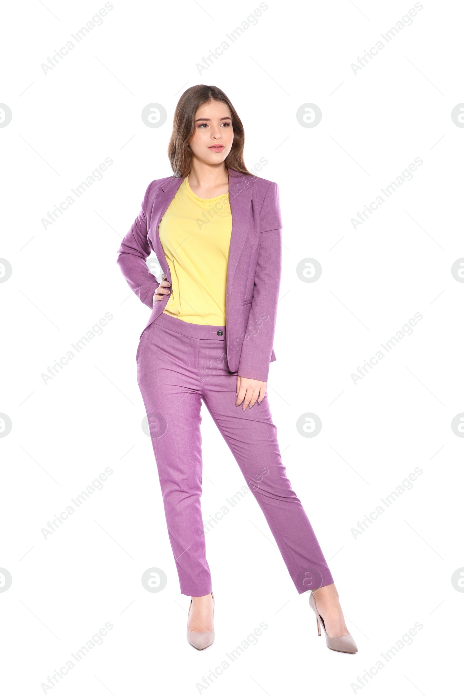 Photo of Attractive girl in stylish suit on white background