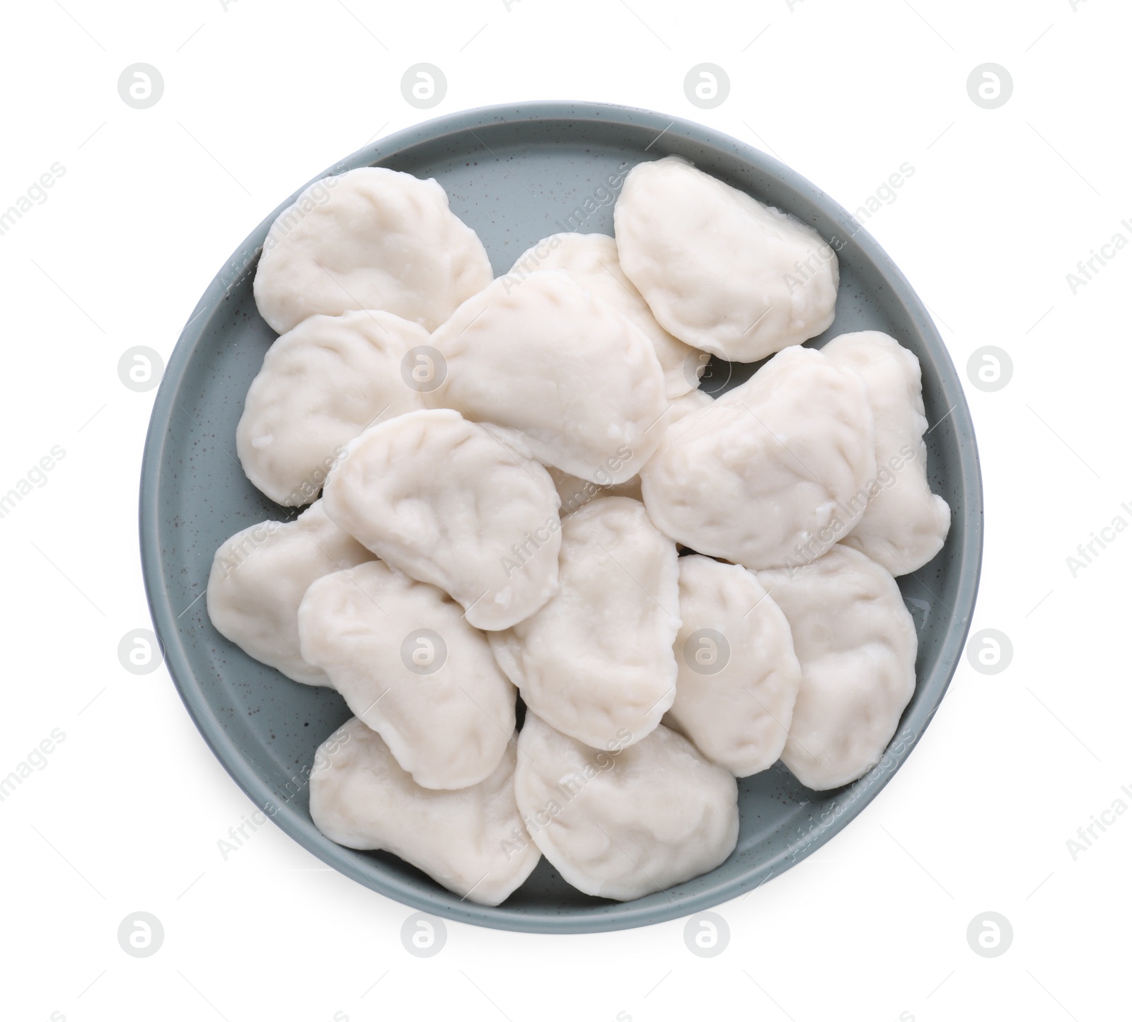 Photo of Plate with tasty dumplings (varenyky) on white background, top view