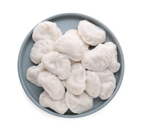 Plate with tasty dumplings (varenyky) on white background, top view