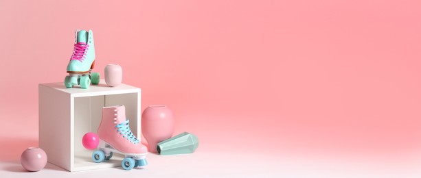 Image of Composition with vintage roller skates and storage cube on color background, space for text. Banner design