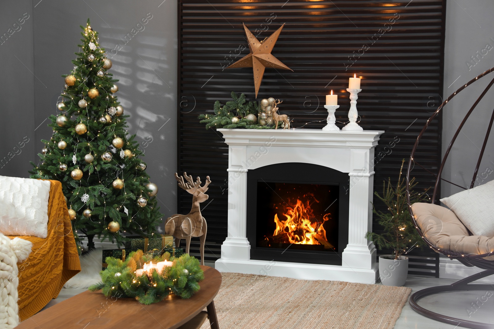 Photo of Beautiful living room interior with burning fireplace. Christmas celebration