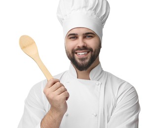 Photo of Happy young chef in uniform holding wooden spoon on white background