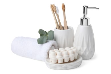 Bath accessories. Set of different personal care products and eucalyptus leaves isolated on white