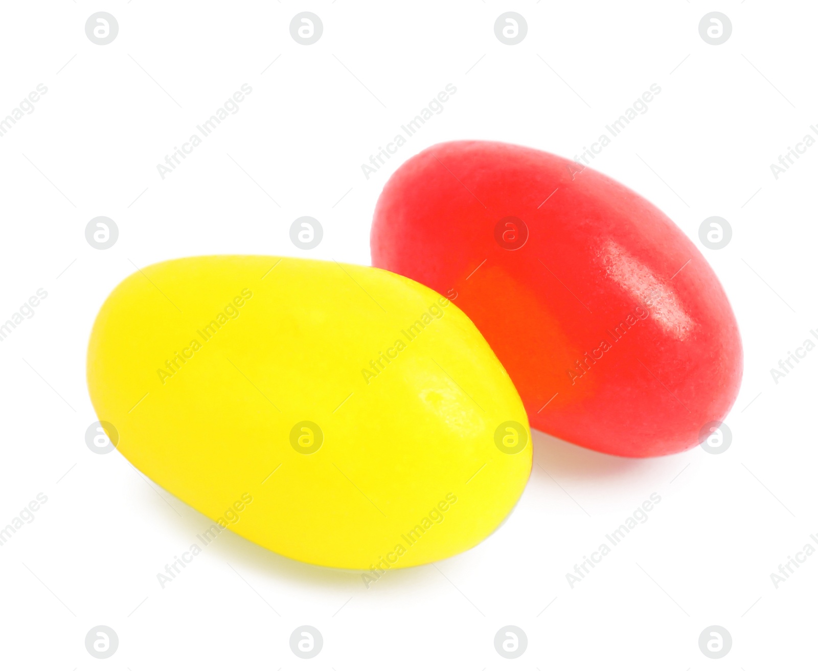 Photo of Delicious colorful jelly beans isolated on white