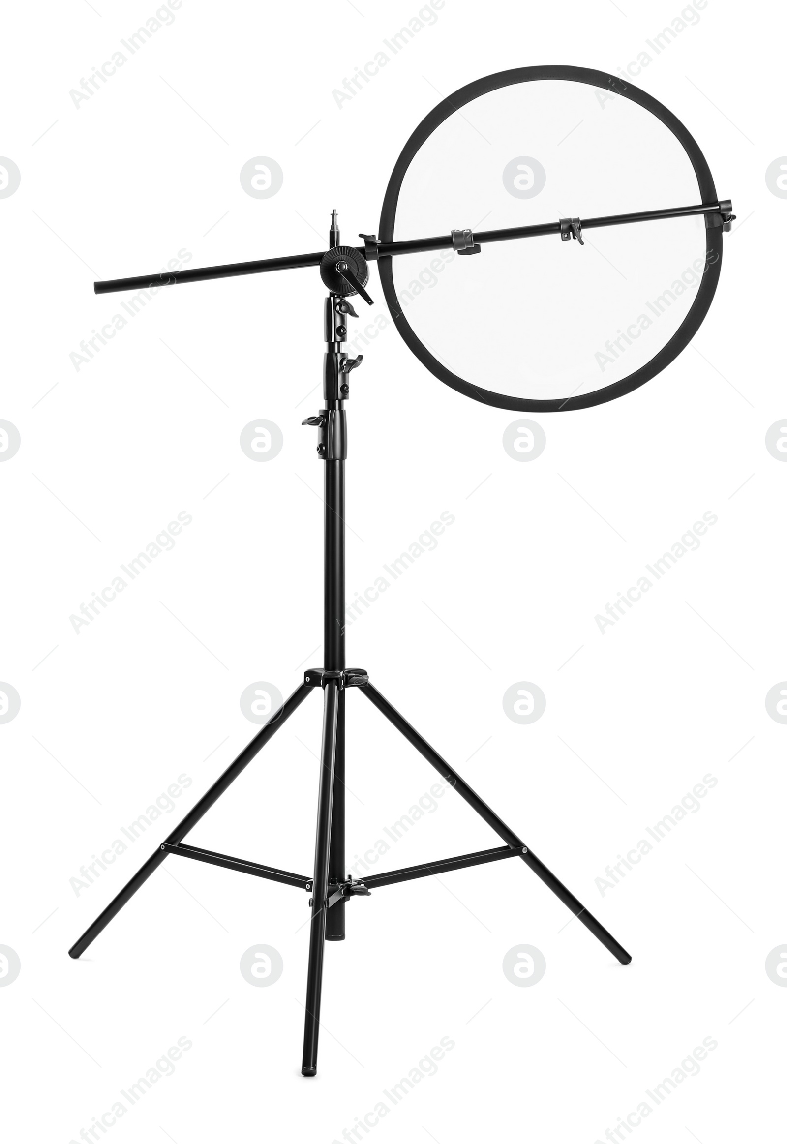 Photo of Tripod with studio reflector isolated on white. Professional photographer's equipment