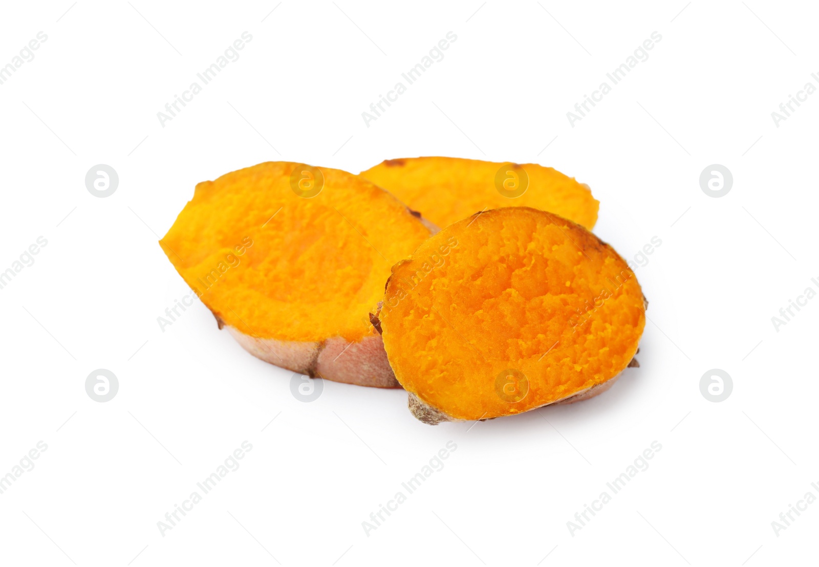 Photo of Slices of fresh turmeric root isolated on white