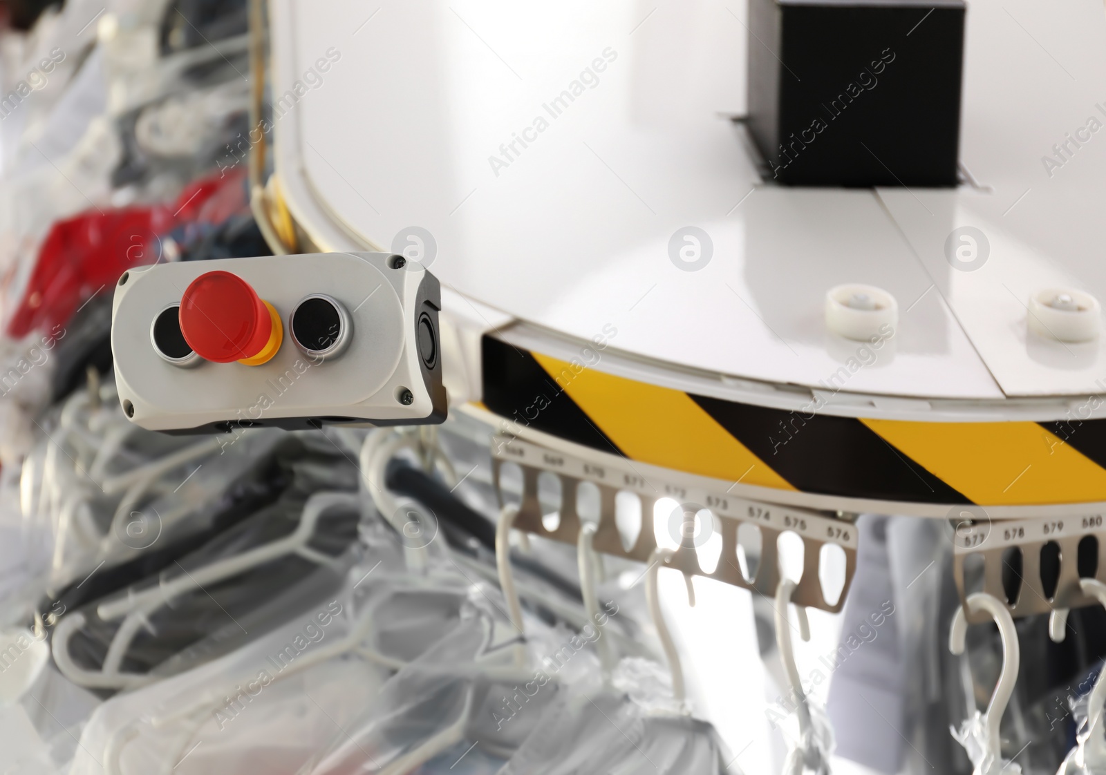 Photo of Control panel of garment conveyor at dry-cleaner's, closeup