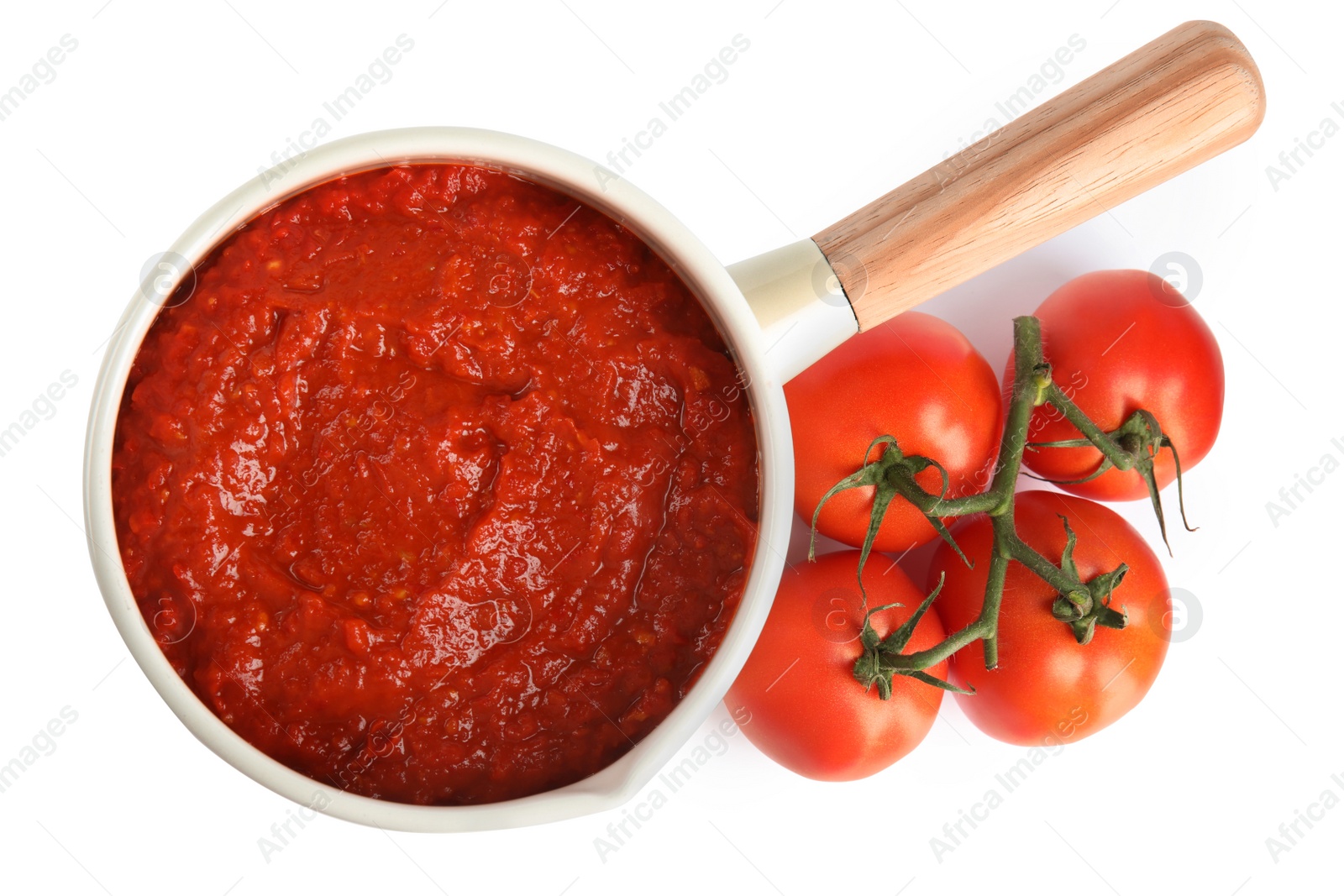 Photo of Delicious tomato sauce in pan isolated on white, top view