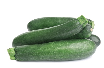 Fresh ripe green zucchinis isolated on white