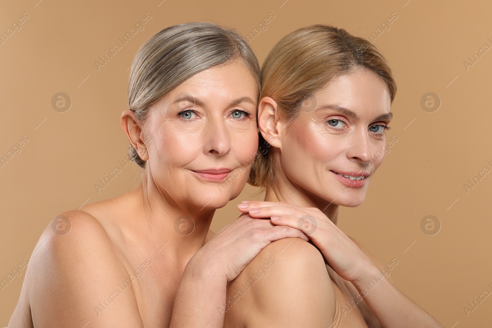 Photo of Beautiful women with healthy skin on beige background