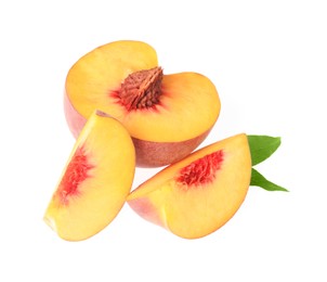 Photo of Delicious fresh ripe cut peach and green leaves isolated on white