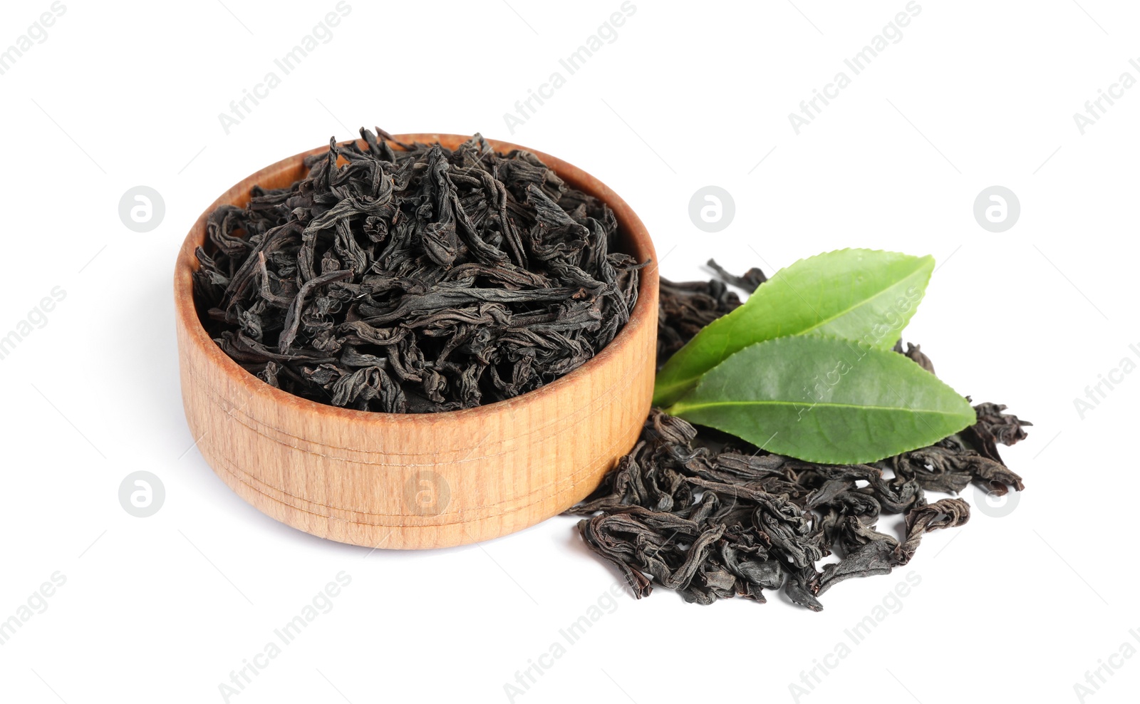 Photo of Dry and fresh tea leaves isolated on white