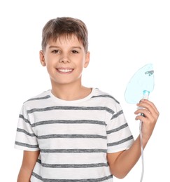Photo of Boy holding nebulizer for inhalation on white background. Space for text