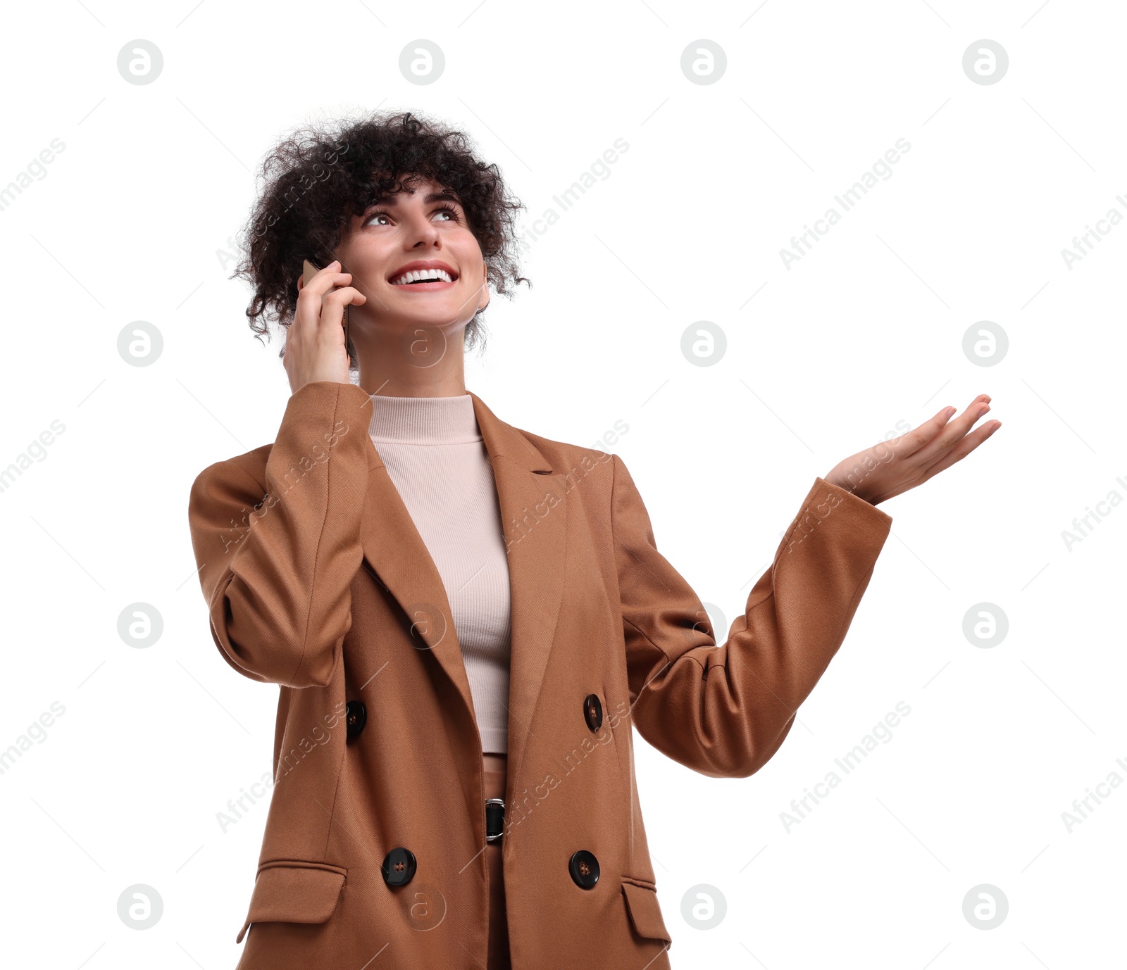 Photo of Beautiful happy businesswoman talking on white background, low angle view