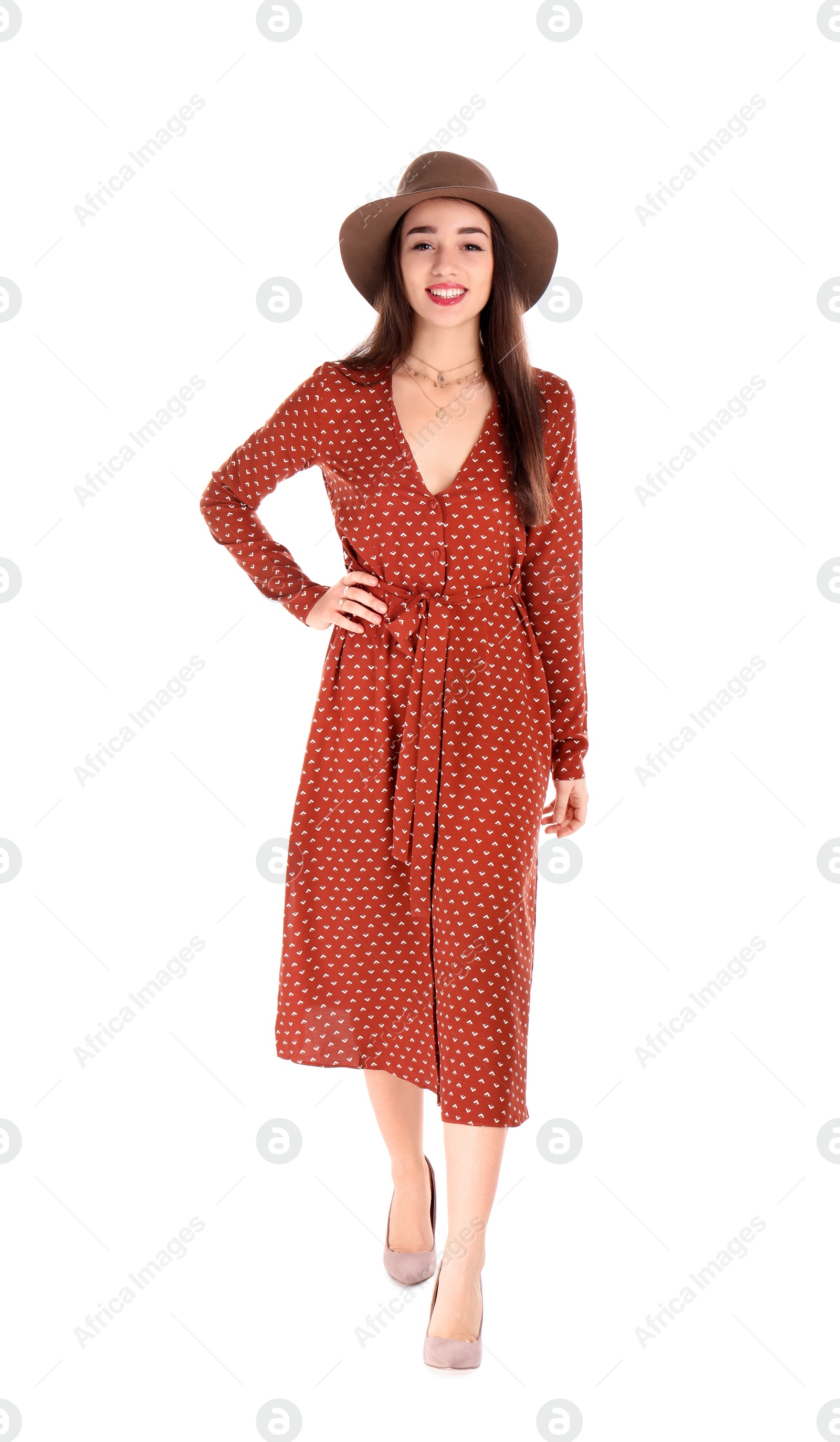 Photo of Portrait of beautiful young woman in stylish dress on white background