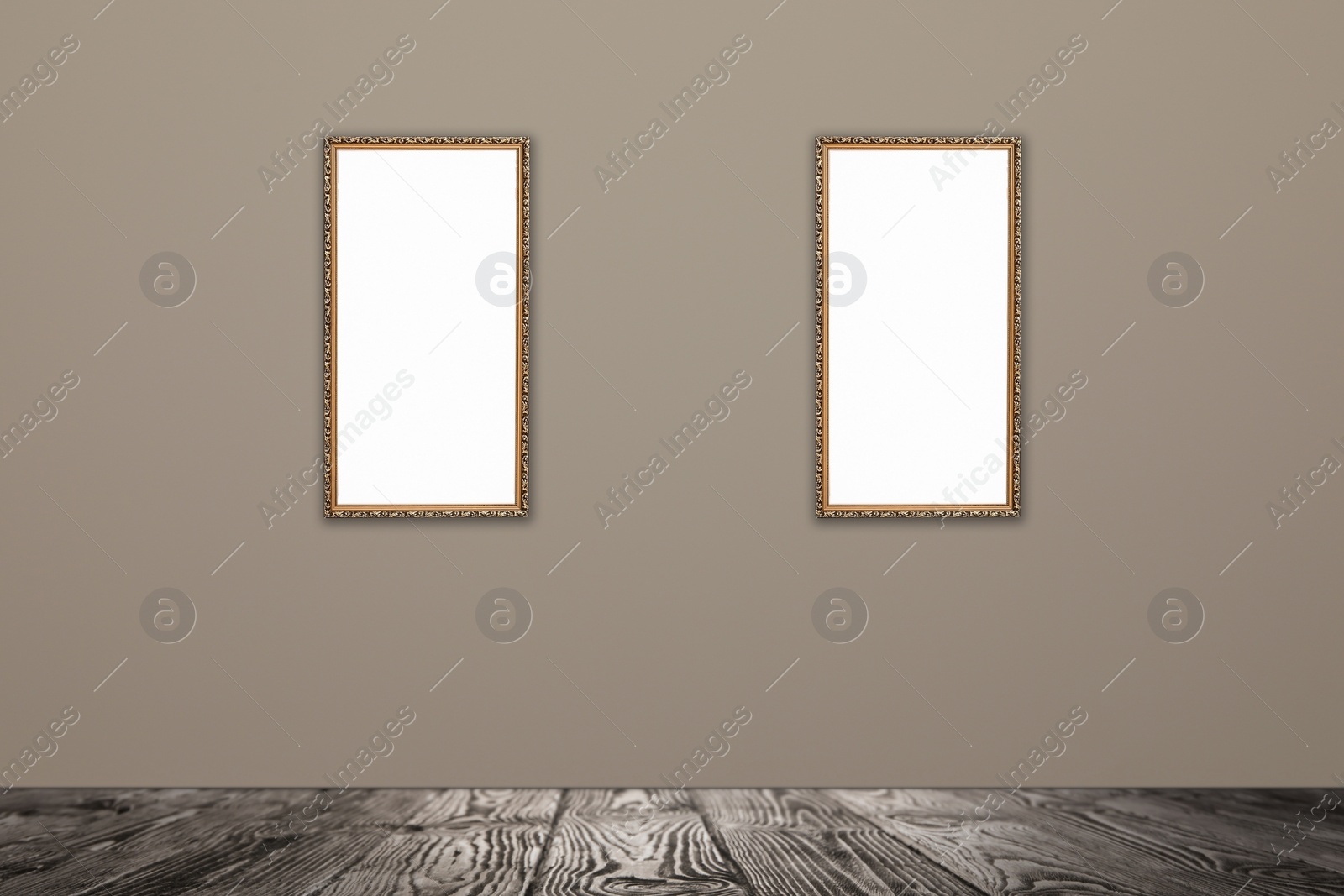 Image of Frames with empty canvases on beige wall in modern art gallery. Space for design