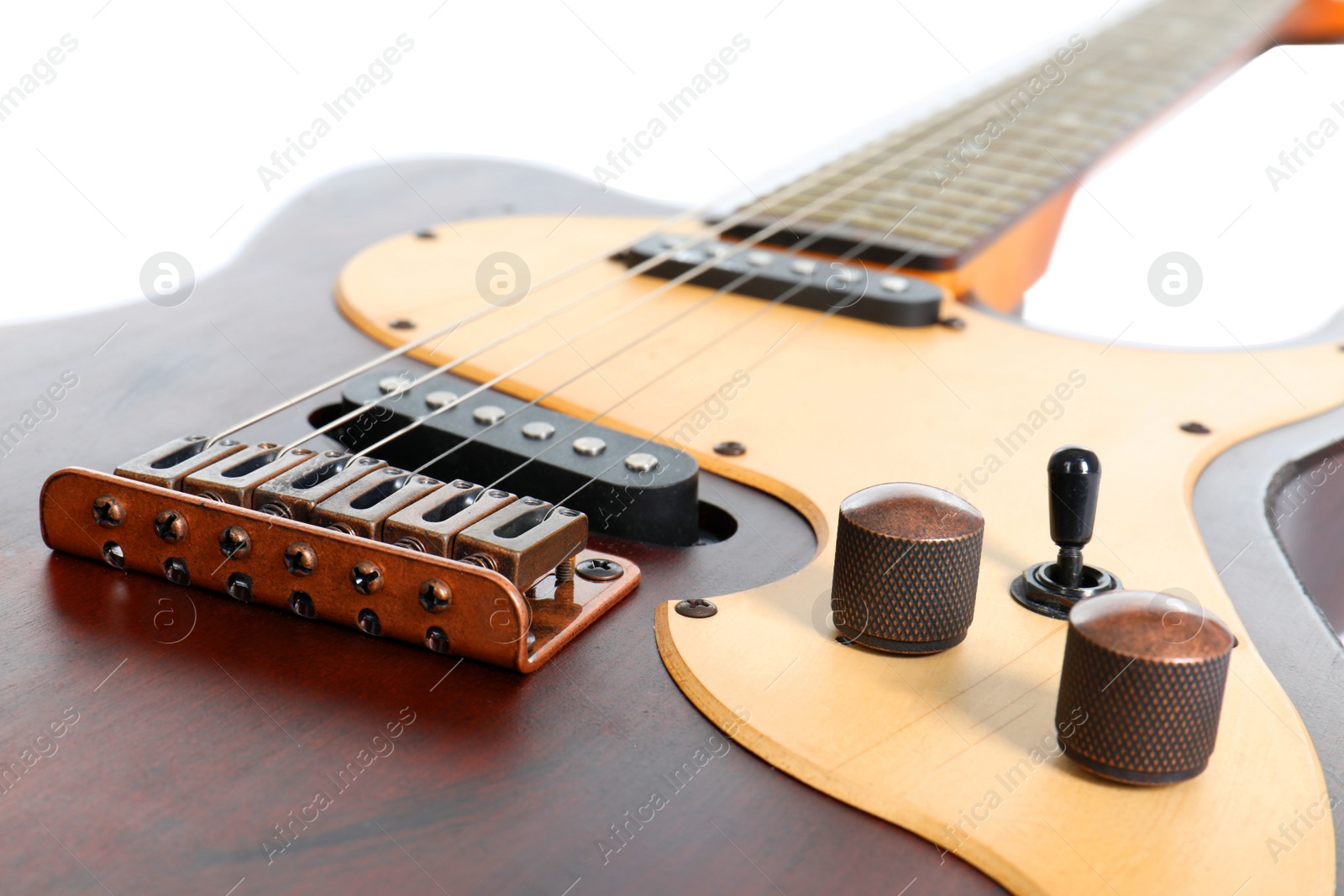 Photo of Electric guitar on white background, closeup. Musical instrument