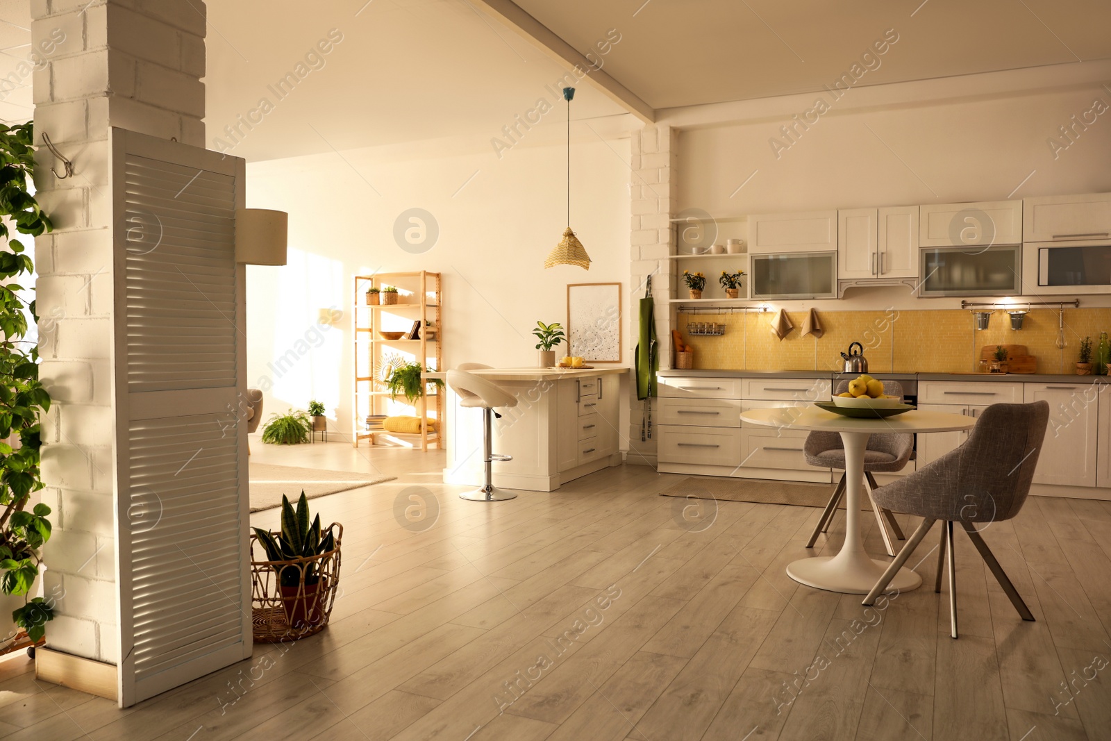 Photo of Modern kitchen interior with stylish white furniture