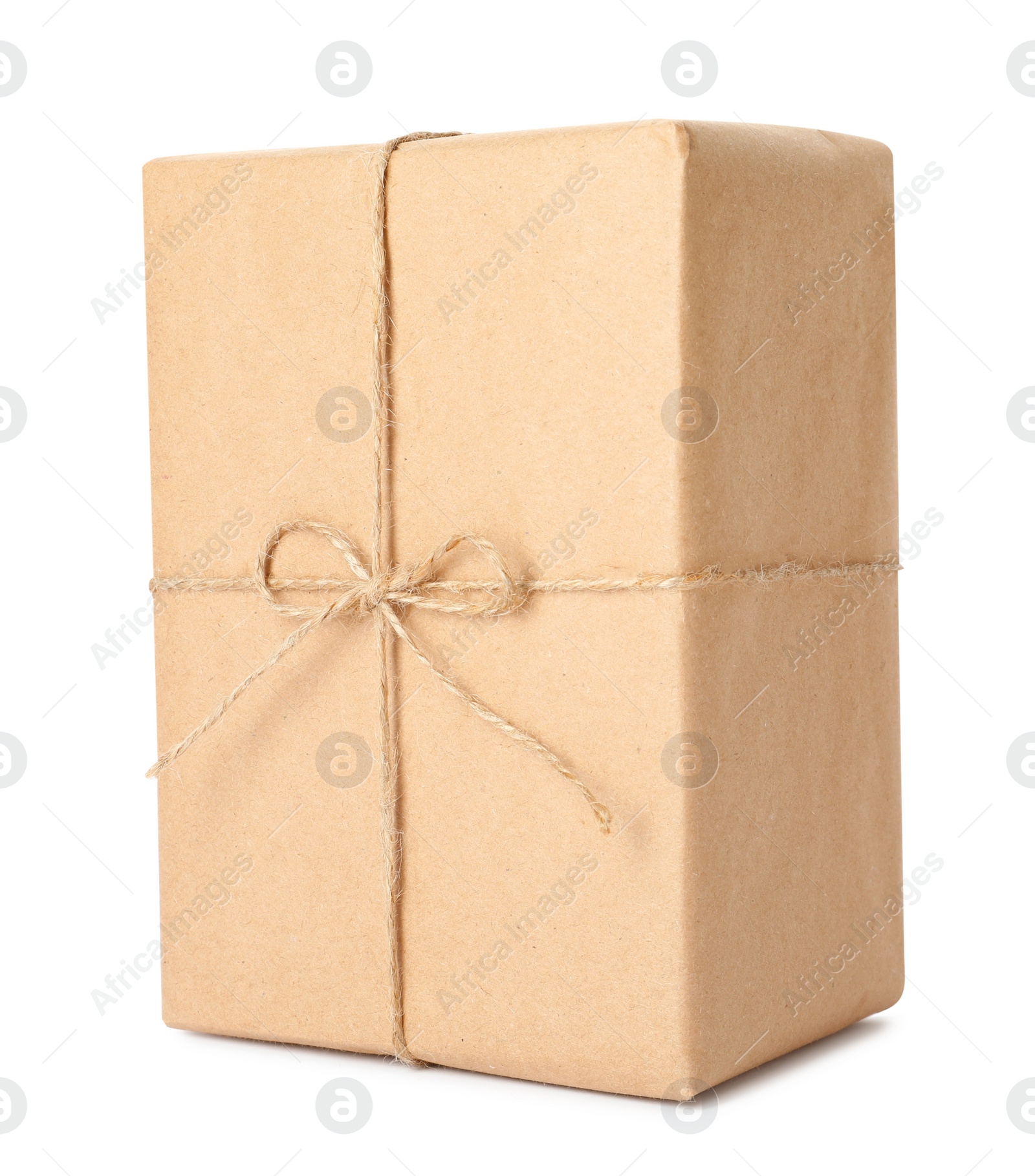 Photo of Parcel wrapped with kraft paper and twine isolated on white